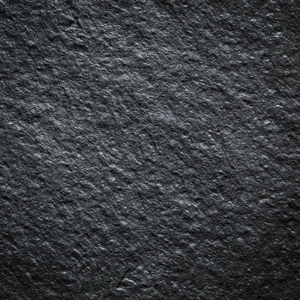 Fondo de piedra de pared negro — Foto de Stock