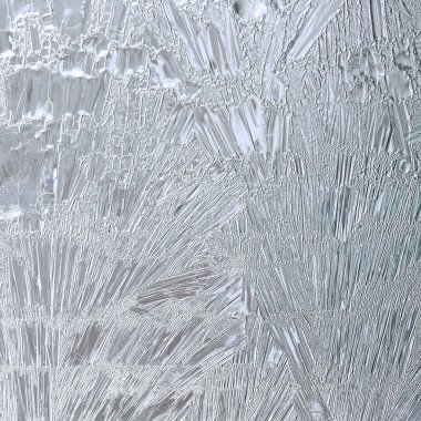 Ice flower frosting on a window clipart