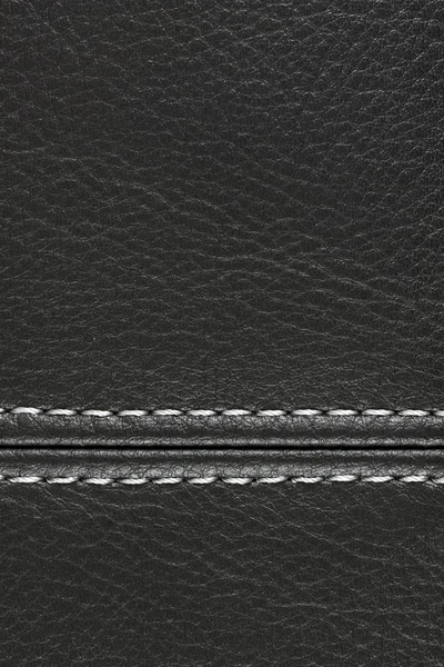 白い糸で縫製黒革 — ストック写真