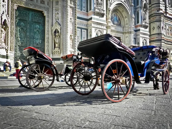 stock image Two carriages in front of the cathedral in Florence Italy