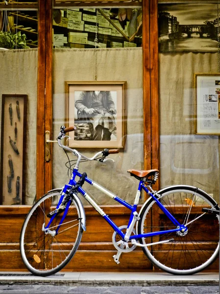 Bike in front of the workshop shoemaker