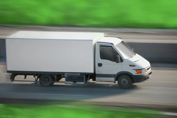 Truck moves on road — Stock Photo, Image
