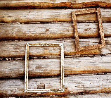 Two wooden frameworks on an ancient timbered wall clipart