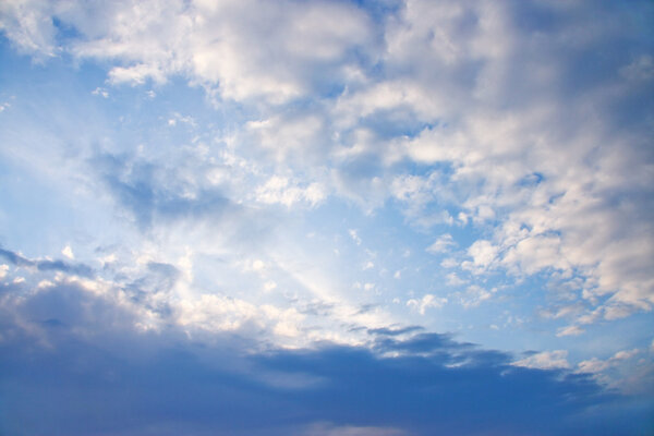 Beautiful blue sky with clouds shined with sun