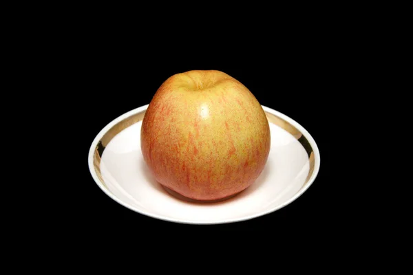 Äpple på svart bakgrund — Stockfoto