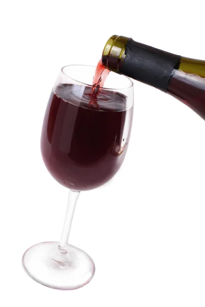 Wine flows in wine glass — Stock Photo, Image
