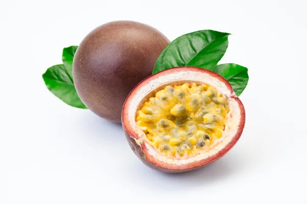 Passion fruit and a half on a white background — Stock Photo, Image