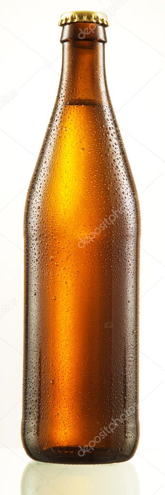 Bottle of beer with drops isolated