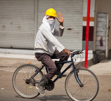 Balinese cyclist clipart