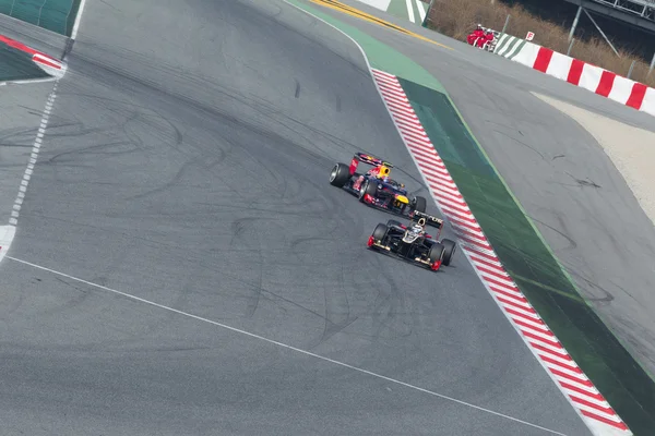 Kimi Räikkönen (Fin) Lotus E20 - Mark Webber (Aus) Red Bull Rácok — Stock Fotó
