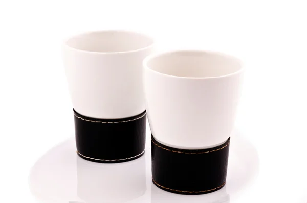 Белые чашки — стоковое фото