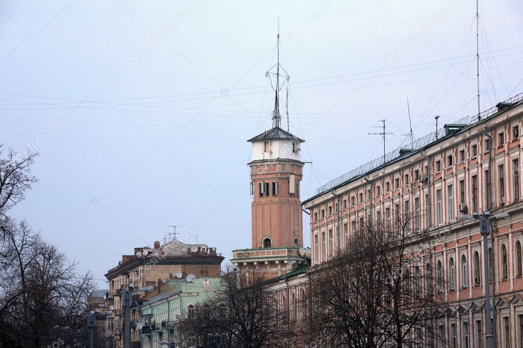 The old fire-tower and facade of an old house