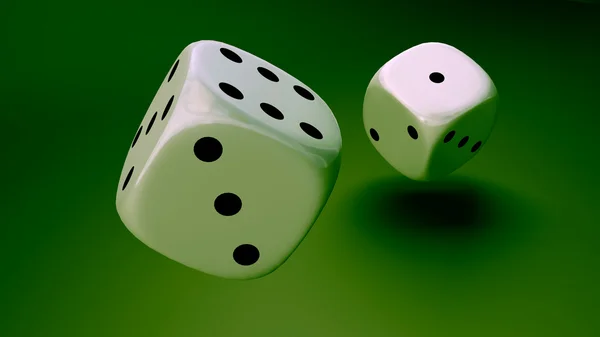 White dice at green background closeup — Stock Photo, Image