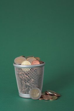 Wasted money - coins clipart