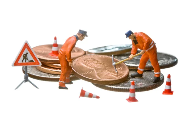 stock image Miniature figures working on a heap of Dollar coins.