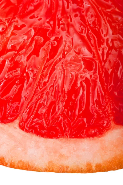 Extreme macro-opname van een rode grapefruit geïsoleerd op wit — Stockfoto