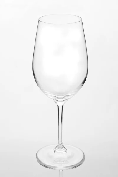 Empty wine glass against a white background — Stock Photo, Image