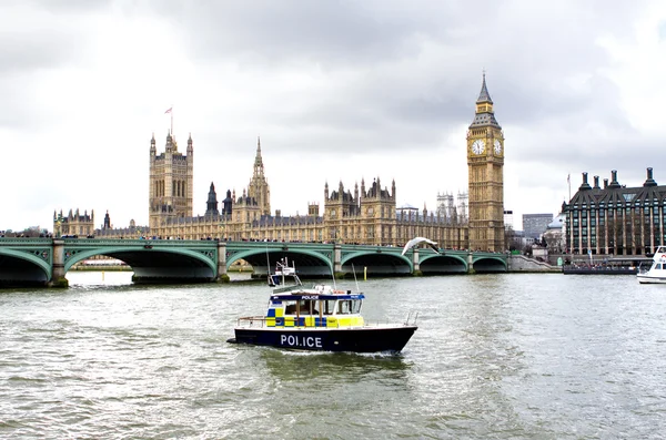 Police boat on the river thames outside parliment — Stock Photo, Image