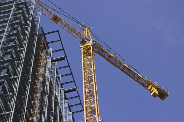 Construction Crane with Building clipart