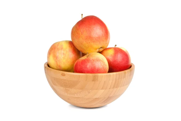 Деревянная чаша с яблоками — стоковое фото