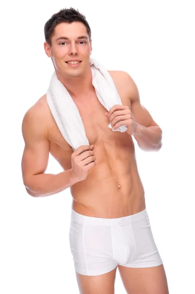 Lächelnder junger Mann mit Unterwäsche — Stockfoto