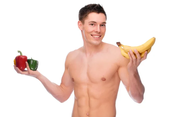 Голий чоловік з фруктами та овочами — стокове фото