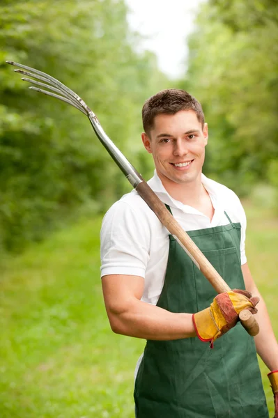 Man with pitchfork — Stock Photo, Image