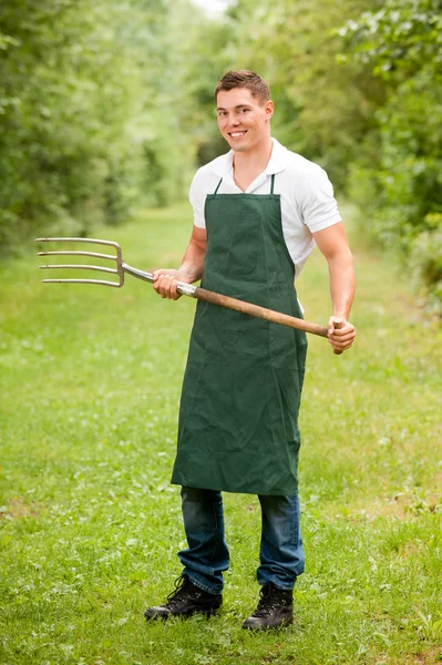 Man with pitchfork — Stock Photo, Image