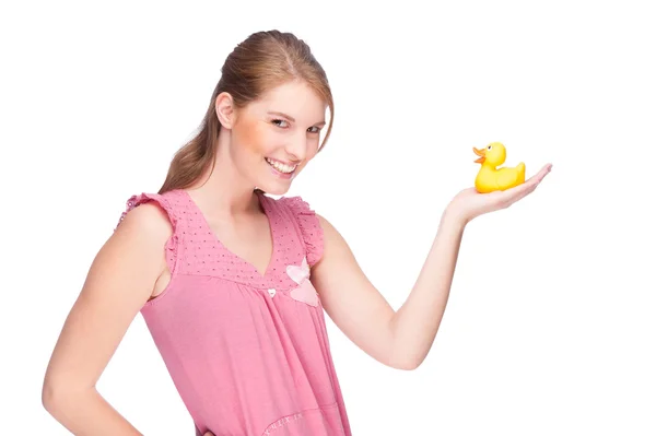Woman with rubber duck — Stock Photo, Image