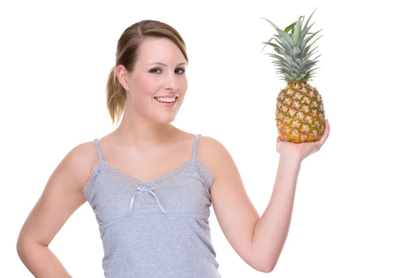 Женщина с ананасом — стоковое фото