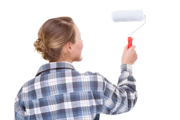 Woman with paint roller — Stock Photo, Image