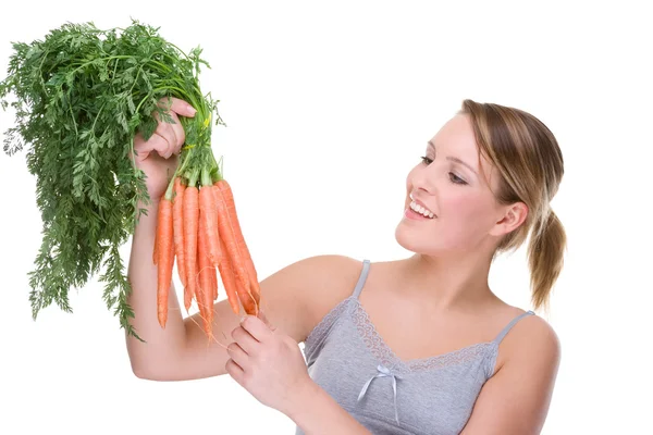 Woman with carrot Royalty Free Stock Images
