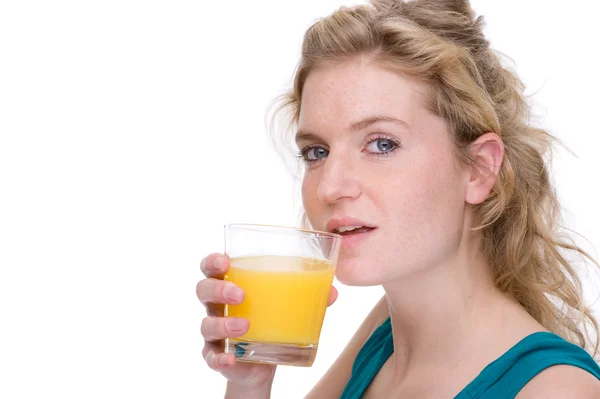 Mulher com suco de laranja — Fotografia de Stock