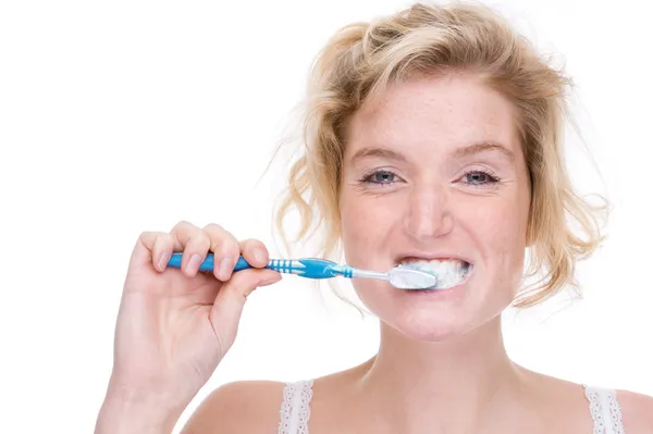 Жінка з зубна щітка — стокове фото
