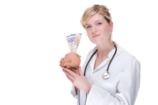 Läkare med piggybank (euro) — Stockfoto