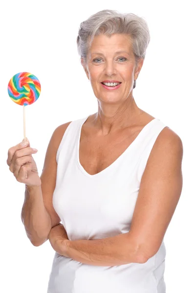 Femme âgée avec des bonbons — Photo