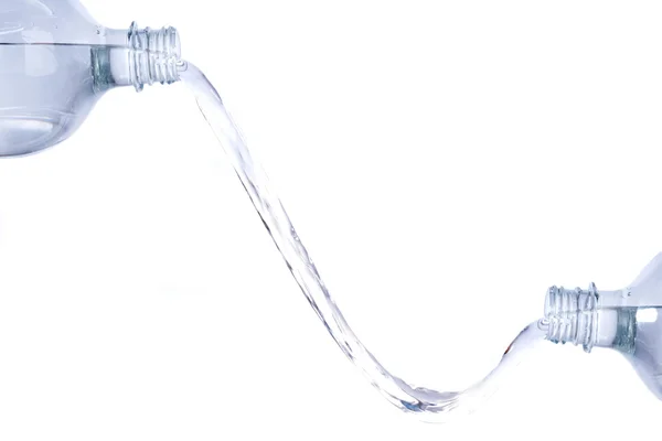 Вода між двома пляшками — стокове фото