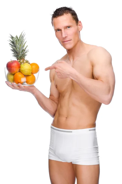 Muž s ovocem — Stock fotografie