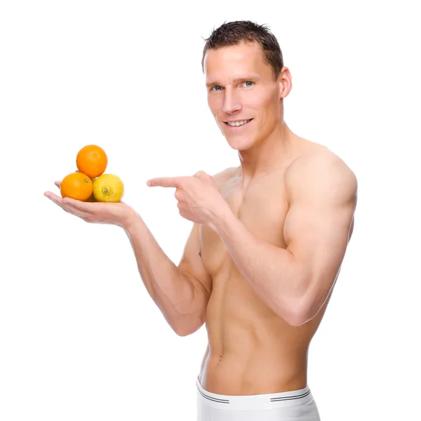 Hombre con frutas —  Fotos de Stock