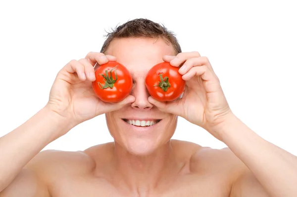 Człowiek z pomidorami — Zdjęcie stockowe