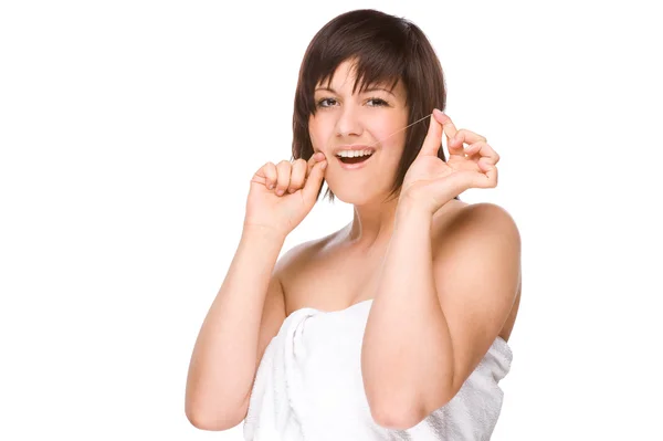 Woman with dental floss — Stock Photo, Image