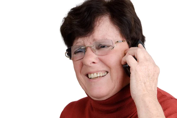 Пожилая женщина с телефоном — стоковое фото