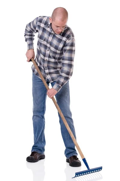 Gardener with a rake — Stock Photo, Image