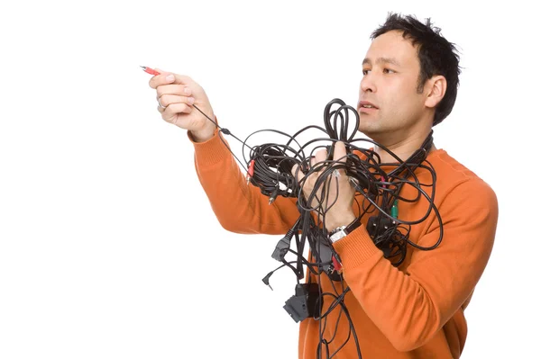 Человек с кабелями — стоковое фото