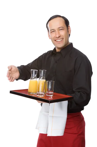 Kelner odlewania soku — Zdjęcie stockowe