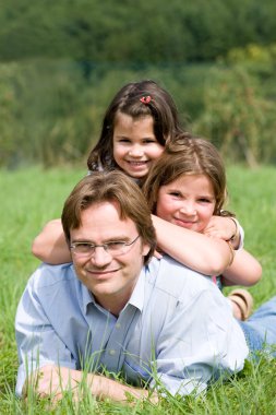 Father with daughters clipart