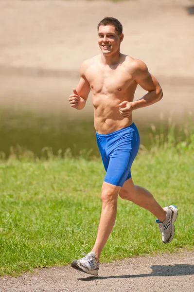 Genç ve mutlu koşucu — Stok fotoğraf