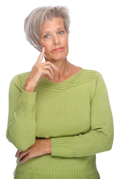 Gondolkodó idősebb nő — Stock Fotó