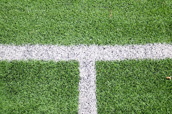 Fußballplatz mit grünem Rasen — Stockfoto