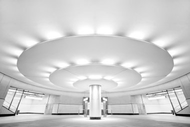 Ultra modern black and white interior of the public subway station clipart